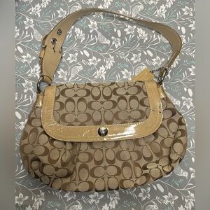 Coach Soho Pleated Signature Flap Handbag
Small stain on the right,